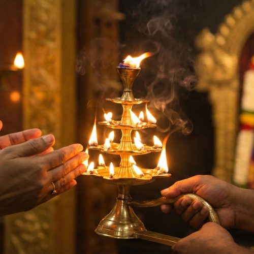 Why Do We Touch the Arati Flame? The Sacred Science of Receiving Divine Light