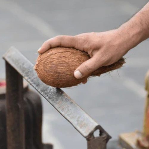 Why Do We Break a Coconut Before Pooja? The Hidden Science of Ego, Surrender, and Sacred Symbolism